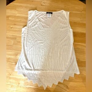 Chic White Sleeveless Blouse with Textured Design